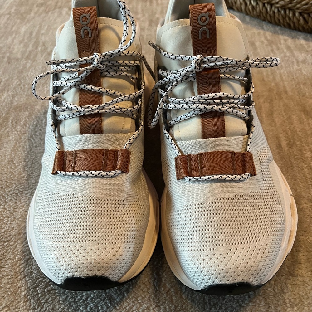 On Running Cream and Tan Athletic Shoes
